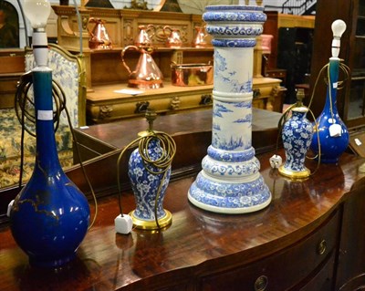 Lot 594 - A pair of Chinese blue and white prunus decorated table lamps, a pair of late 19th century blue...