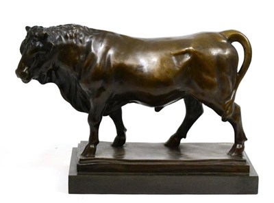 Lot 595 - A reproduction bronzed figure of a bull on a marble base