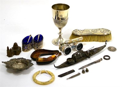 Lot 603 - A group of silverwares including stem goblet, London 1896; condiments; filigree gondola and clothes