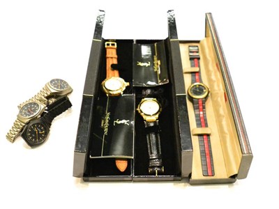 Lot 616 - Two Yves Saint-Laurent lady's wristwatches and a Ferrari branded wristwatch, together with...