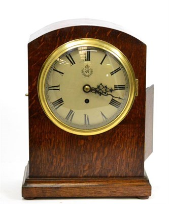 Lot 621 - An oak veneered table timepiece, circa 1930, arched case, 7-1/2-inch silvered dial marked RAF,...