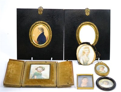 Lot 643 - An early 20th century portrait miniature of a young girl in a gilt tooled leather case;...