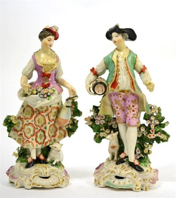 Lot 655 - A pair of 18th century Derby figures of a shepherd and shepherdess, each on scroll moulded...