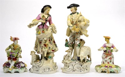 Lot 657 - A pair of 18th century Derby porcelain figure of a lady and gentleman holding baskets of fruit,...