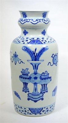 Lot 666 - A Chinese Kangxi style blue and white rouleau vase with shaped neck and everted rim, unglazed base