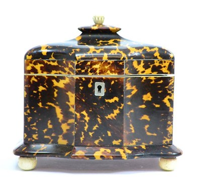 Lot 668 - Mid Victorian tortoiseshell tea caddy hinged lid enclosing two little compartments raised on...