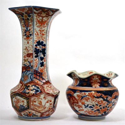 Lot 678 - 19th century Imari decorated vase, 39cm high and a Japanese Imari jardiniere, diameter 19cm