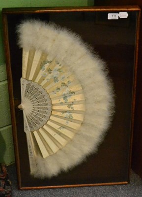 Lot 711 - A Chinese feather fan, with paper panel painted with flowering branches, pierced and inlaid...