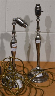 Lot 720 - A pair of Edwardian silver plated table lamps