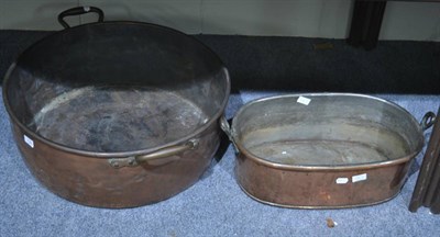 Lot 728 - A large copper pan together with a copper fish pan