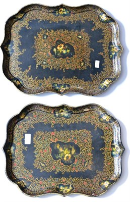 Lot 795 - A papier mâché tray by B Walton & Co, circa 1840, painted with flowersprays in panels on a...