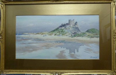 Lot 1025 - Thomas Swift Hutton (c.1865-1935) Bamburgh Castle, signed, watercolour heightened with white,...