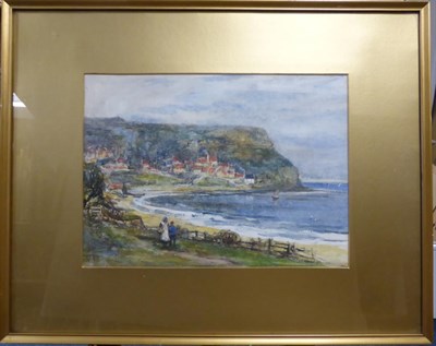 Lot 1040 - Rowland Henry Hill (1873-1952) Figures walking before Runswick Bay, signed and dated 1932,...