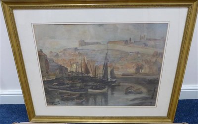 Lot 1052 - Thomas Swift Hutton (c.1865-1935) Whitby Abbey and castle from the harbour, signed,...