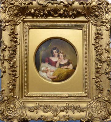 Lot 1065 - Circle of William Etty RA (1787-1849) Two young ladies gathered at the bedside of a sleeping child