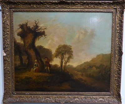 Lot 1122 - Follower of JC Ibbetson (1759-1817) A country squire standing in landscape beside a seated lady...