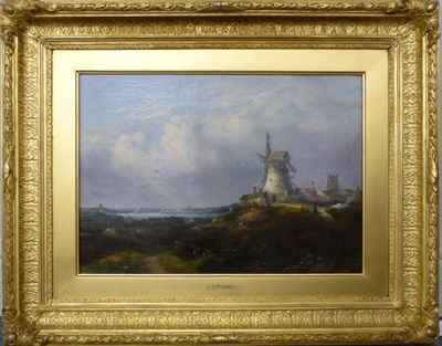 Lot 1168 - Circle of John Crome (19th century) Figures at rest before a windmill, an extensive landscape...