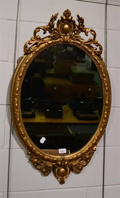 Lot 1201 - A 19th Century gilt composition oval mirror