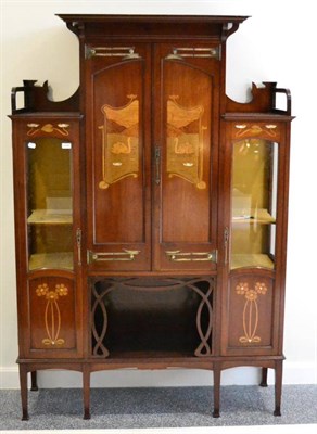 Lot 1208 - An Art Nouveau mahogany and marquetry inlaid display cabinet, circa 1900, the central section...