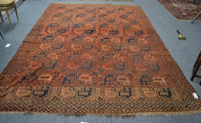 Lot 1213 - An Ersari carpet, Amu Darya region, The madder field with columns of elephant foot güls...