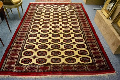 Lot 1236 - A Tekke Turkmen carpet, North Afghanistan, the cream ground with five columns of quartered...