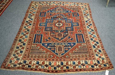 Lot 1244 - A 19th century Bergama rug, West Anatolia, the madder field with central stepped medallion...