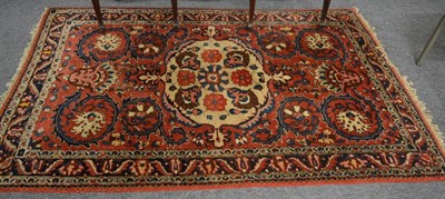 Lot 1248 - A Bakhitiari rug, West Iran, The faded rose red field of angular serrated vines around an ivory...