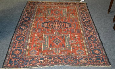 Lot 1252 - A Karajah rug of unusual size, Persian Azerbaijan, the brick red field with central hooked...