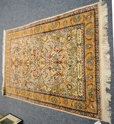 Lot 1261 - Kashmir silk piled prayer rug, North West India, the ivory field of scrolling vines centred by...