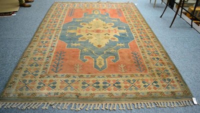 Lot 1262 - A Kozak carpet, West Anatolia, the ice blue field centred by an ivory medallion framed by...