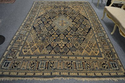 Lot 1263 - Carpet of Joshaghan design, probably Tabriz, the deep indigo lattice field of stylised plants...