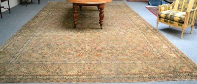 Lot 1279 - Kirman Ravar carpet, South East Persia, The pale sand field with an allover floral lattice enclosed