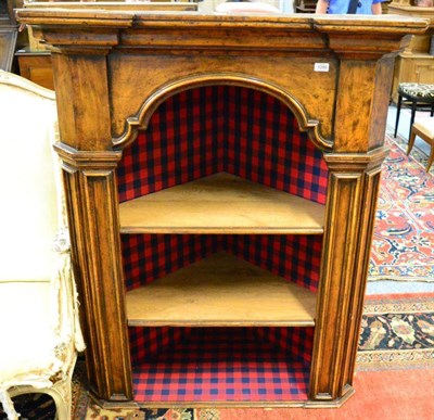 Lot 1289 - A 19th Century North Italian walnut corner cupboard with moulded cornice