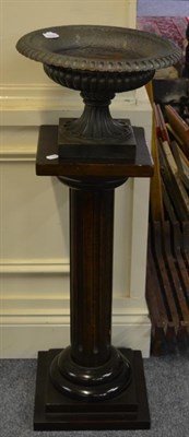 Lot 1320 - A pair of cast metal urns, on square plinth bases, 39cm diameter, together with a pair of...