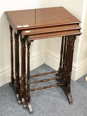 Lot 1327 - #A set of three rosewood nesting tables, of graduated form