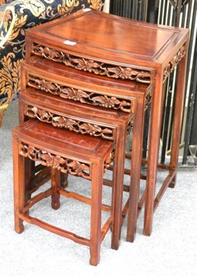 Lot 1332 - A nest of four Chinese hardwood tables, largest 52cm