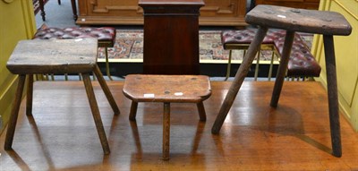 Lot 1339 - Two provincial elm stools and a smaller ash fruitwood example