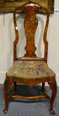 Lot 1343 - An 18th century Dutch walnut marquetry side chair with vase shaped splat, shaped drop-in seat...