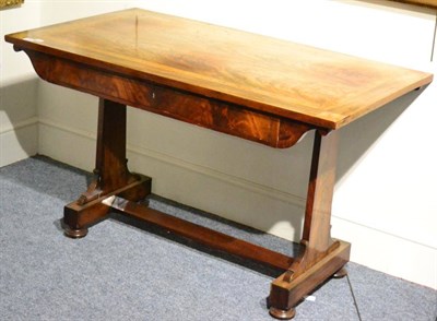 Lot 1344 - A Regency library table in faded mahogany with single drawer, with key