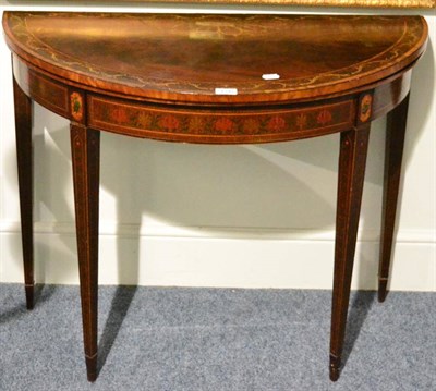 Lot 1347 - A George III mahogany, satinwood and polychrome painted fold over card table