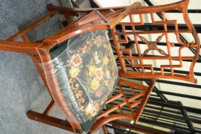 Lot 1360 - A pair of Chinese Chippendale style armchairs, with needlework drop in seats