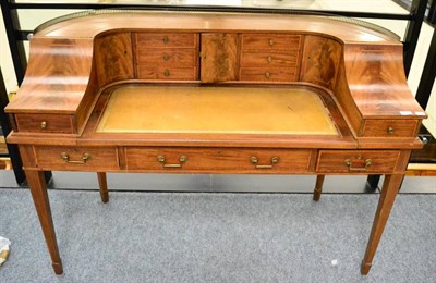 Lot 1376 - A Carlton House style mahogany and satinwood banded writing desk