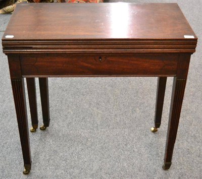 Lot 1378 - A rare 18th century card/games table, with three hinged leaves enclosing gaming wells and a...