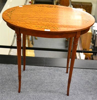 Lot 1381 - An Edwardian satinwood and floral painted oval occasional table