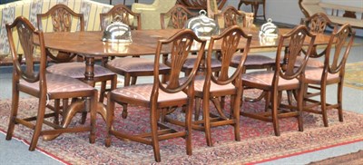 Lot 1384 - A set of ten reproduction mahogany shield back dining chairs, of recent date, in Hepplewhite style