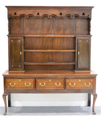 Lot 1394 - An 18th century and later oak dresser