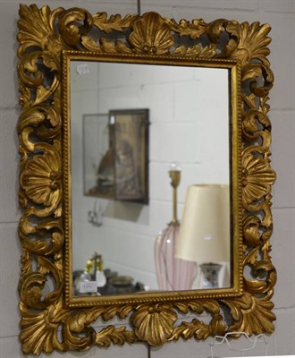 Lot 1398 - an Early 19th Century carved gilt wood mirror