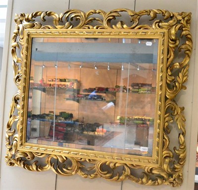 Lot 1422 - A 19th century gilt and gesso Florentine wall mirror