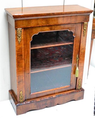 Lot 1423 - #Victorian walnut pier cabinet with gilt metal mounts