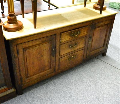 Lot 1445 - A Georgian pine and oak dresser base